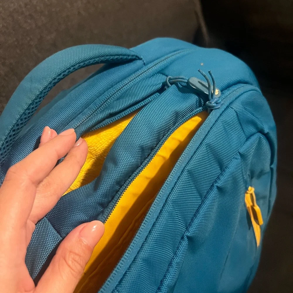 Incase Teal Backpack with Yellow Zipper